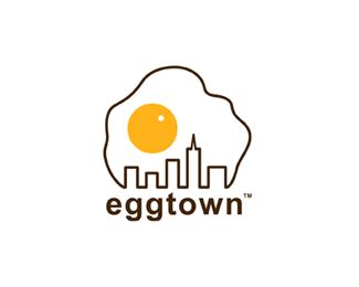 Eggtown Logo Design In Brown And White With Orange Accent