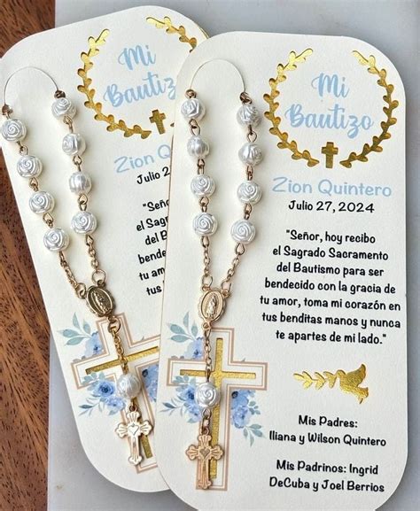 Two Rosary Necklaces With The Words Mi Bautire Written In Spanish On Them