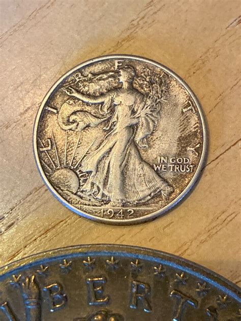 1942 90 Silver Walking Liberty Half Dollar And 3 Inch Token