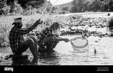 Big game fishing fly Black and White Stock Photos & Images - Alamy