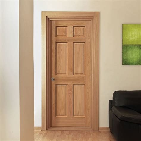 Masonite 24-in x 80-in Natural Solid core 6-panel Left hand Textured ...