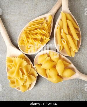 Raw Penne Pasta On The Wood Background Stock Photo Alamy