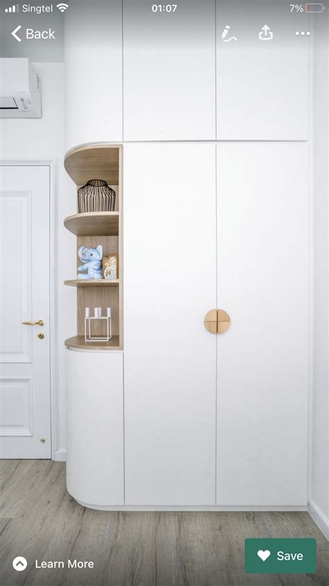 White Closet With Wooden Shelves