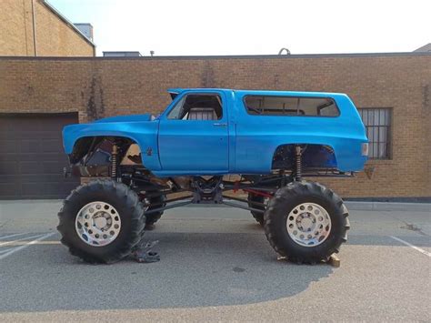 Blue Monster Truck In Parking Lot