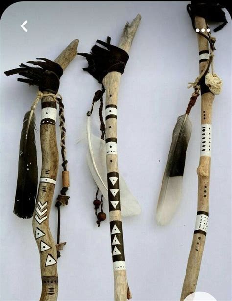 Pin By Hollie On Walking Sticks Stick Art Feather Crafts Painted Sticks