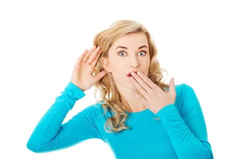 Premium Photo Portrait Of Shocked Young Woman Over White Background