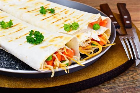 Pita Bread With Vegetables Chinese Noodles And Arugula Stock Image