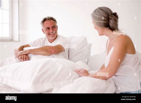 Mature Couple Bed Laugh Hi Res Stock Photography And Images Alamy