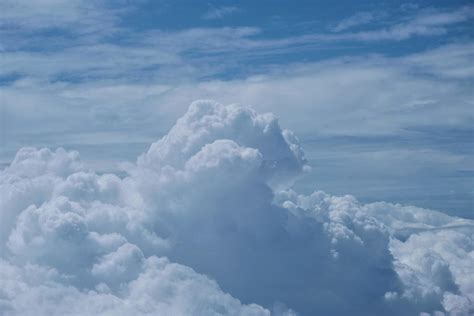 Photo of clouds from the plane 11018731 Stock Photo at Vecteezy