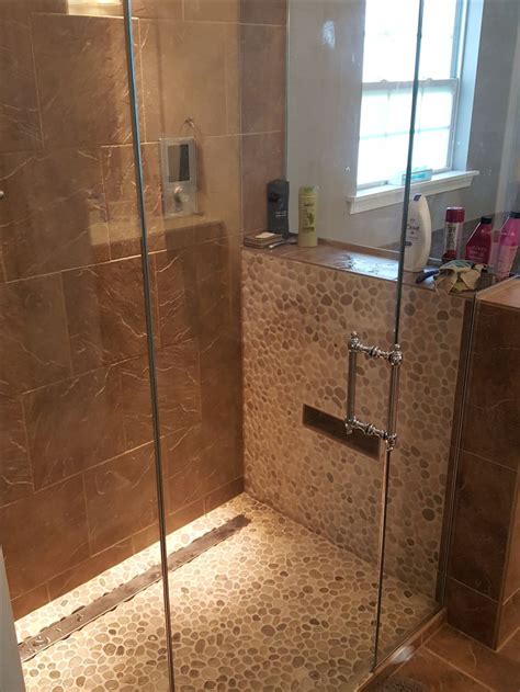 Stunning Glazed Java Tan Pebble Tile Wall And Floor In This Updated