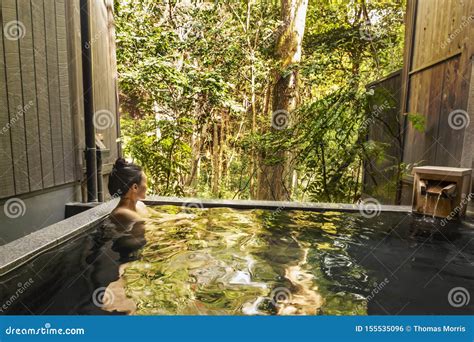 Beautiful Asian Woman Bathing Nude In An Onsen Hot Tub Stock Photo