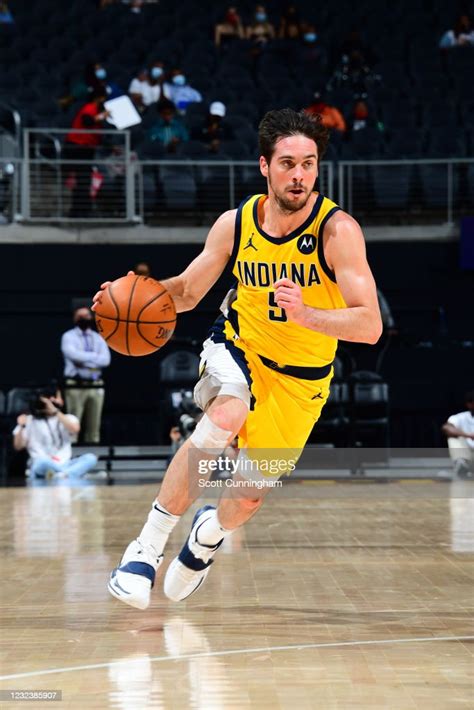 T J Mcconnell Of The Indiana Pacers Drives To The Basket Against The