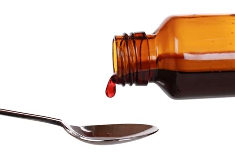premium photo liquid medicine dropping   bottle