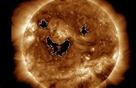 Photo from NASA satellite shows the sun was 'smiling' this week