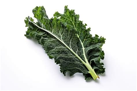 Premium Photo A Bunch Of Green Leafy Vegetables On A White Surface