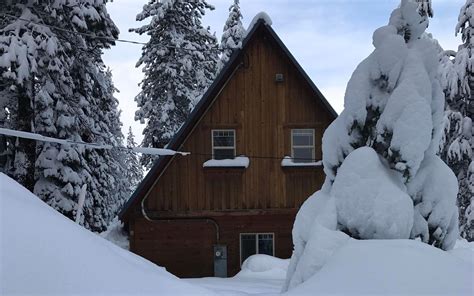 15 snow-covered cabins that will make you want to retreat to the woods ...