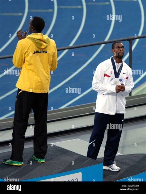 Jamaica S Usain Bolt The Gold Medalist Left And Tyson Gay Of The United States Silver Right