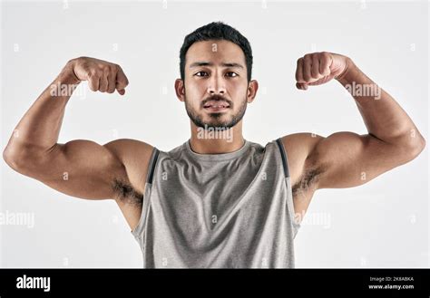 Male bodybuilder flexing biceps hi-res stock photography and images - Alamy