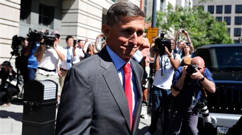 Justice Department Drops Charges Against Former Trump Aide Michael ...