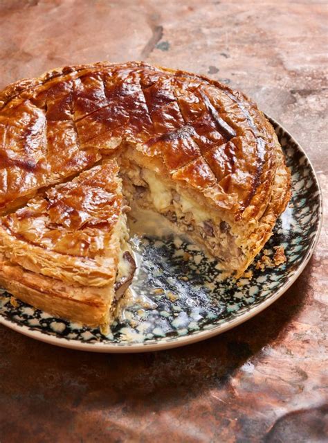 A Pie On A Plate With One Slice Cut Out