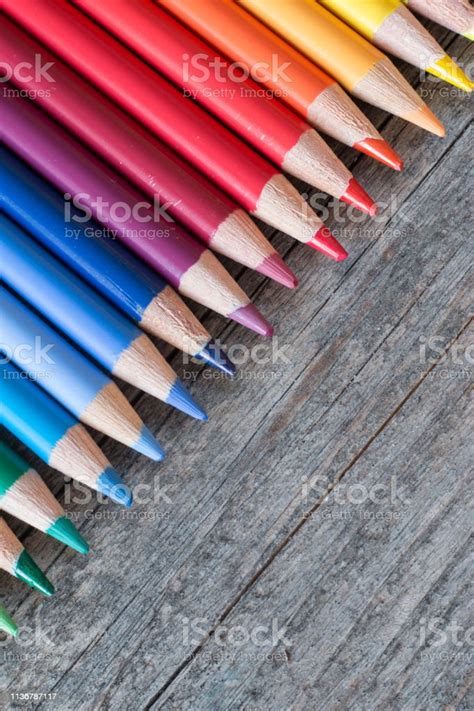 Creativity Colored Pencils In A Can On Rustic Wooden Table White