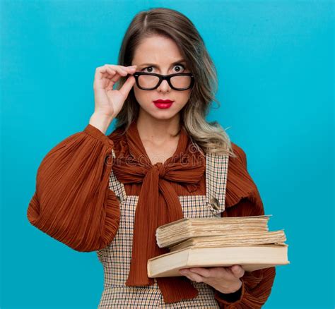 Young Teacher In Glasses With Books Stock Photo - Image of face, people ...