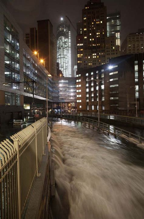 A deluge of water floods the Battery Tunnel in Manhattan as Hurricane ...