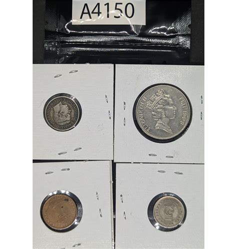 Four World Coins, 1960s and 1990s (A4150)