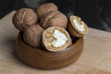 Open And Broken Walnut Shells Lying On The Table Stock Image Image Of