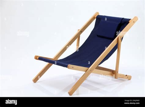 Empty Blue Deck Chair Against White Background Stock Photo Alamy