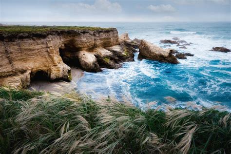 Dramatic Coastline Landscape Rocky Cliffs Pacific Ocean And Native