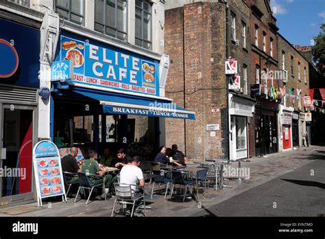 Workmen Eating Outside In Summer At The Elite Cafe In Whitecross Street