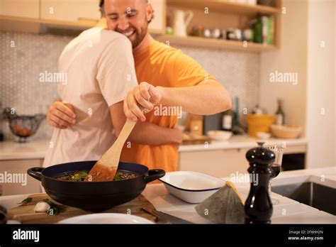 Gay Couple Hugging Kitchen Hi Res Stock Photography And Images Alamy