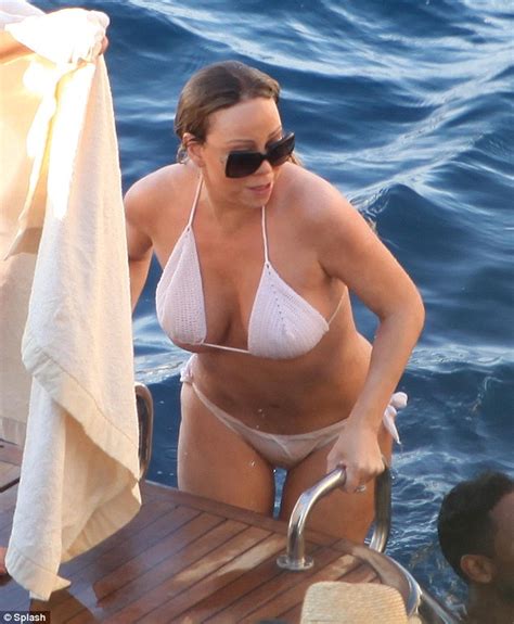 Mariah Carey Shows Off Her Flawless Figure In A Daring Black Monokini