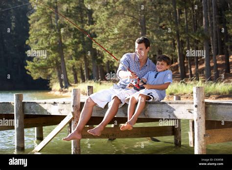 Father And Son Fishing Stock Photo Alamy