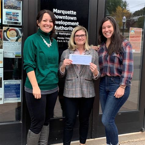 Downtown Marquette Farmers Market Receives Donation from Range Bank