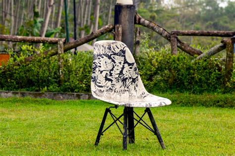 Premium Photo | A painted garden chair in the park