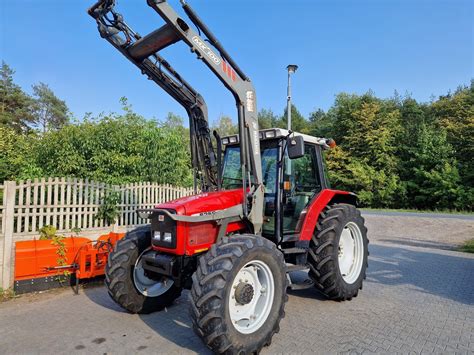 Massey Ferguson 6255 z ładowaczem MX 100 mf 6245 Renault Ares 6460