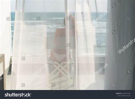Naked Beautiful Female Bikini Sitting On Stock Photo Edit Now 1298125252