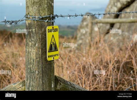 Danger, mine shaft, sign Stock Photo - Alamy