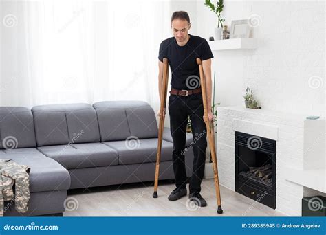 Young Leg Injured Man with Crutches Stock Image - Image of young, injury: 289385945