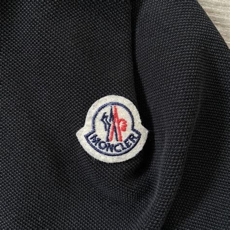 Moncler polo size large, as you can see it’s been... - Depop
