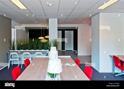 Modern Office Interior With Several Flexible Work Spaces In A Serviced Offices Building Stock