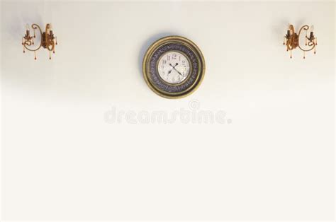 Vintage Clock on a White Wall Stock Photo - Image of antique, evening ...