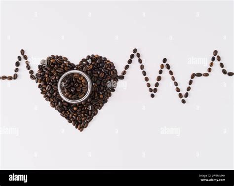 Creative Layout With Heart Shape Made Of Roasted Coffee Beans And