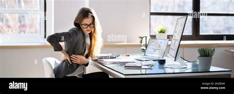 Back Pain Bad Posture Woman Sitting Stock Photo - Alamy