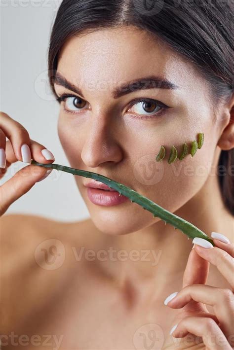 Naked Woman Is In The Studio Against White Background With Aloe Vera 15251544 Stock Photo At