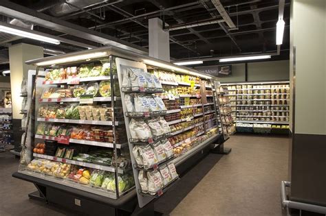 An Empty Grocery Store Filled With Lots Of Food And Drink Bottles In It