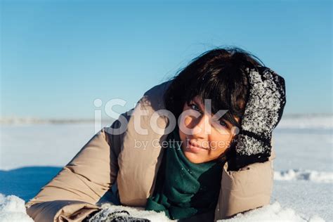 Girl Lying On The Snow Stock Photo | Royalty-Free | FreeImages