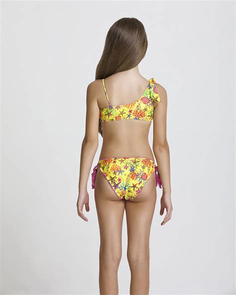 Bikini Monospalla Fucsia Reversibile In Giallo Con Fantasia Stelle